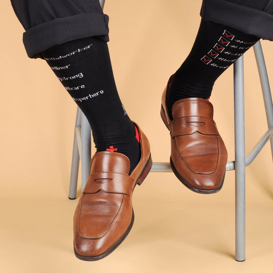 MashasCorner.com Health Care Heroes-Saving Lives- Ultra Premium Novelty Socks Material: 68% cotton, 29% polyester, 3% spandex Sizes: available in S/M and L/XL S/M: men shoe size: 4.5-7.5, ladies shoe size: 5.5-9.5 L/XL: men shoe size: 8-12, ladies shoe size: 10-10.5 Unisex style