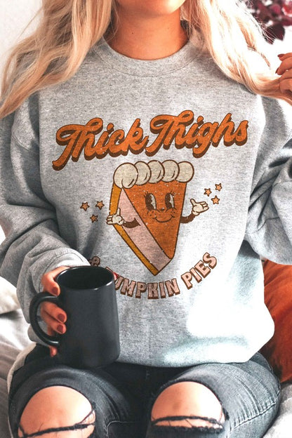 THICK THIGHS & PUMPKIN PIES GRAPHIC SWEATSHIRT