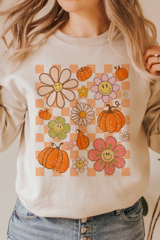 CHECKERED PUMPKINS AND DAISIES GRAPHIC SWEATSHIRT