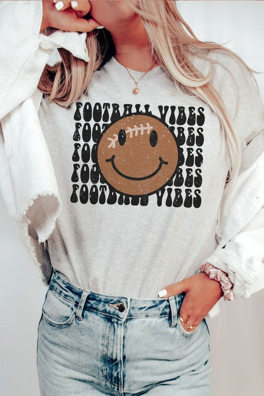 FOOTBALL HAPPY FACE FOOTBALL VIBES GRAPHIC TEE